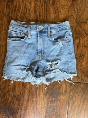 Levi’s Distressed Light Blue Denim Women’s Shorts, size 25